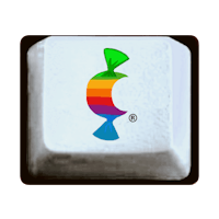 a white computer keyboard with an apple logo on it